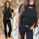 UNIQUE THE LABEL NENA SHORT SLEEVE TOP BLACK